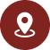 Location pin icon on red circular background.